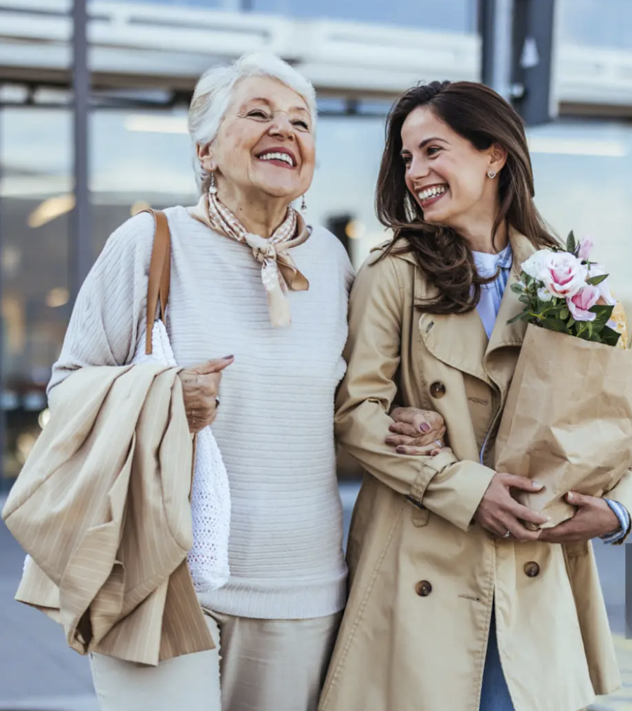 Carer helping elderly lady with shopping in Christchurch